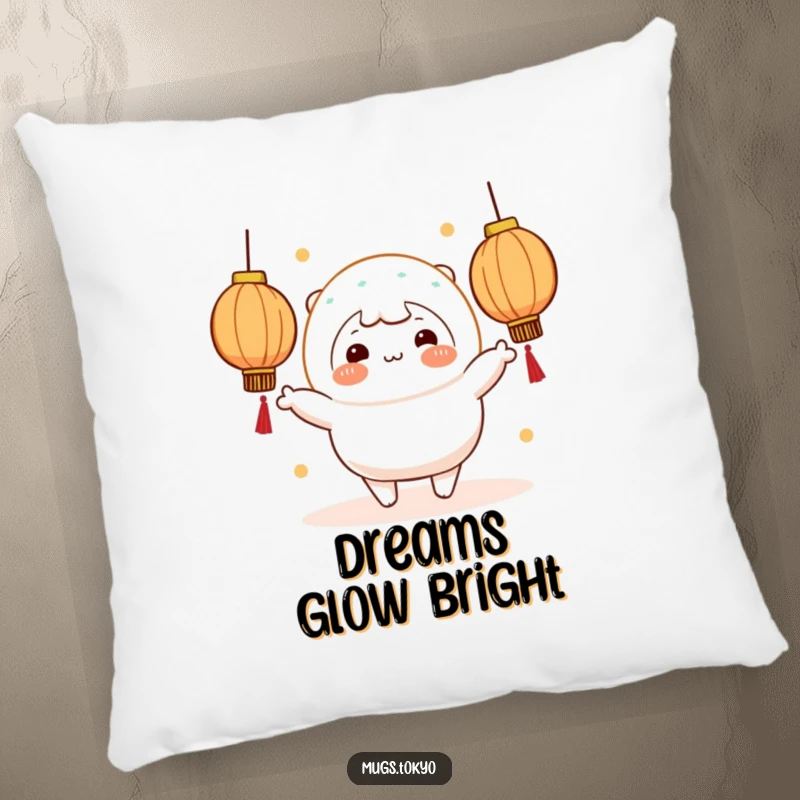 A soft pillow featuring a funny cheerful rosy-cheeked mochi character juggling glowing lanterns.