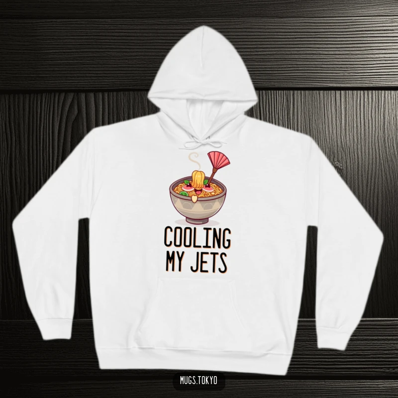 A warm hoodie featuring a funny happy ramen bowl character with steam, waving a tiny fan.