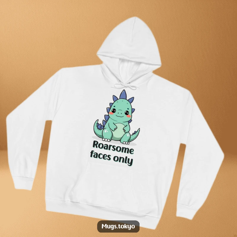 Funny hoodie featuring a character making a silly face to surprise a small, cartoonish Godzilla, cozy and amusing.
