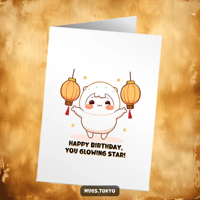 Funny free printable birthday card with a cheerful mochi character juggling glowing lanterns, spreading birthday joy.