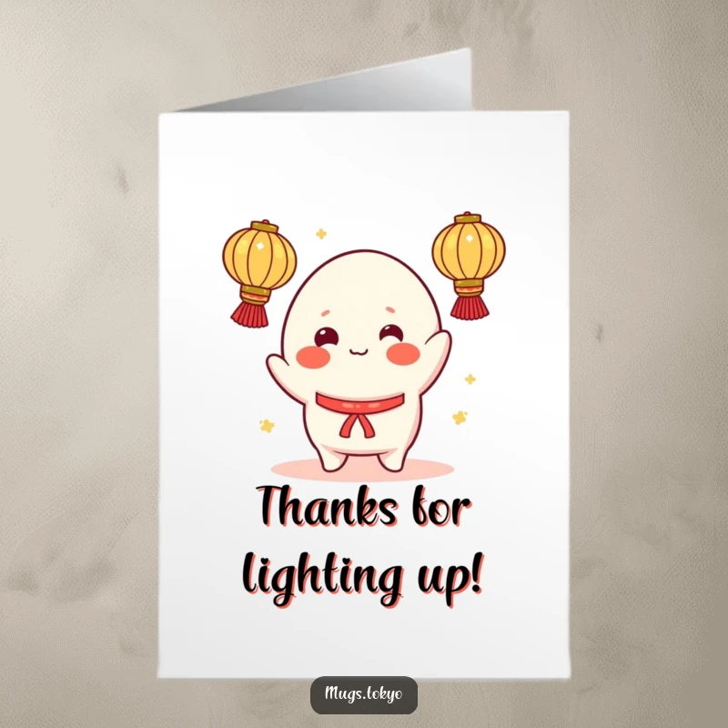 Funny Free Printable Thank You Card: A cheerful mochi character with rosy cheeks juggles glowing lanterns, bringing light.