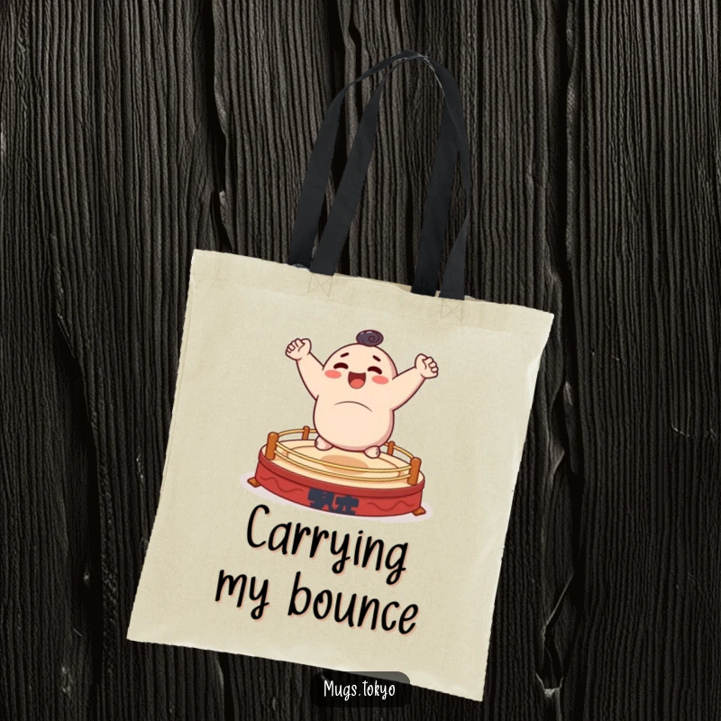 Funny tote bag showing a character happily bouncing on a tiny sumo ring, practical and amusing.